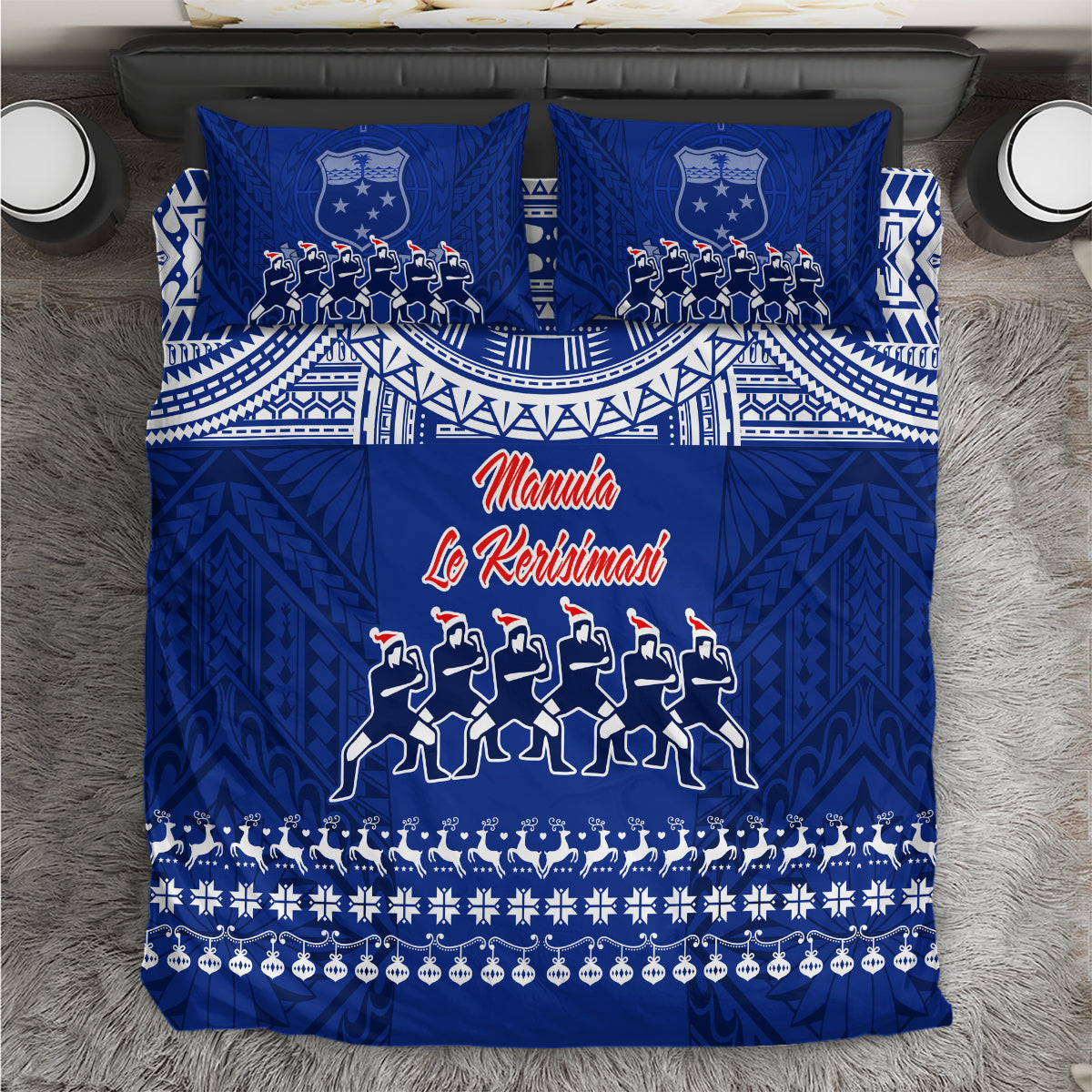 Blue patterned Christmas bedding set with runners and decorative border, featuring red script text