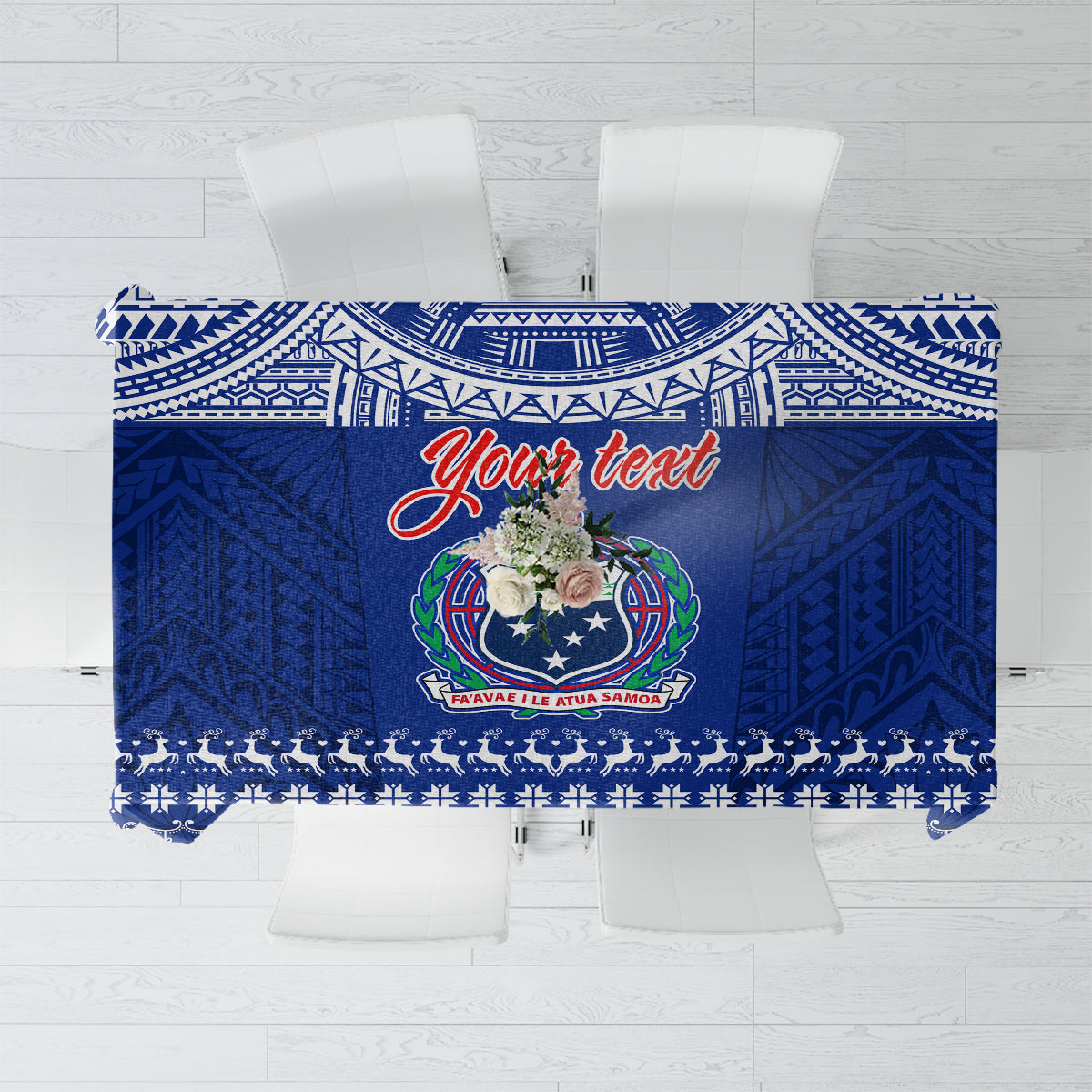 Blue patterned Christmas tablecloth with central crest and festive banner