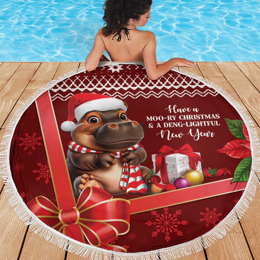 Red round beach blanket with white fringe, hippo wearing striped scarf and New Year text