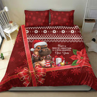 Red Christmas bedding set top view with cow character, snowflake pattern, gift bow, and two pillows