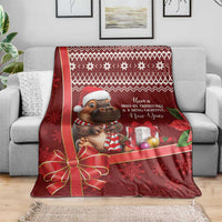 Red Christmas blanket with cartoon hippo, presents, and snowflake motifs