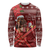 Red long-sleeve Christmas shirt with hippo Santa hat and gift bow graphic