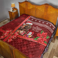 Red Christmas quilt spread on wooden bed, cartoon mouse holding gifts, patterned snowflake band