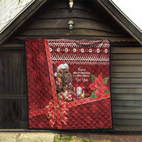 Red Christmas quilt with quilted texture, cartoon mouse holding gifts, poinsettias and lights