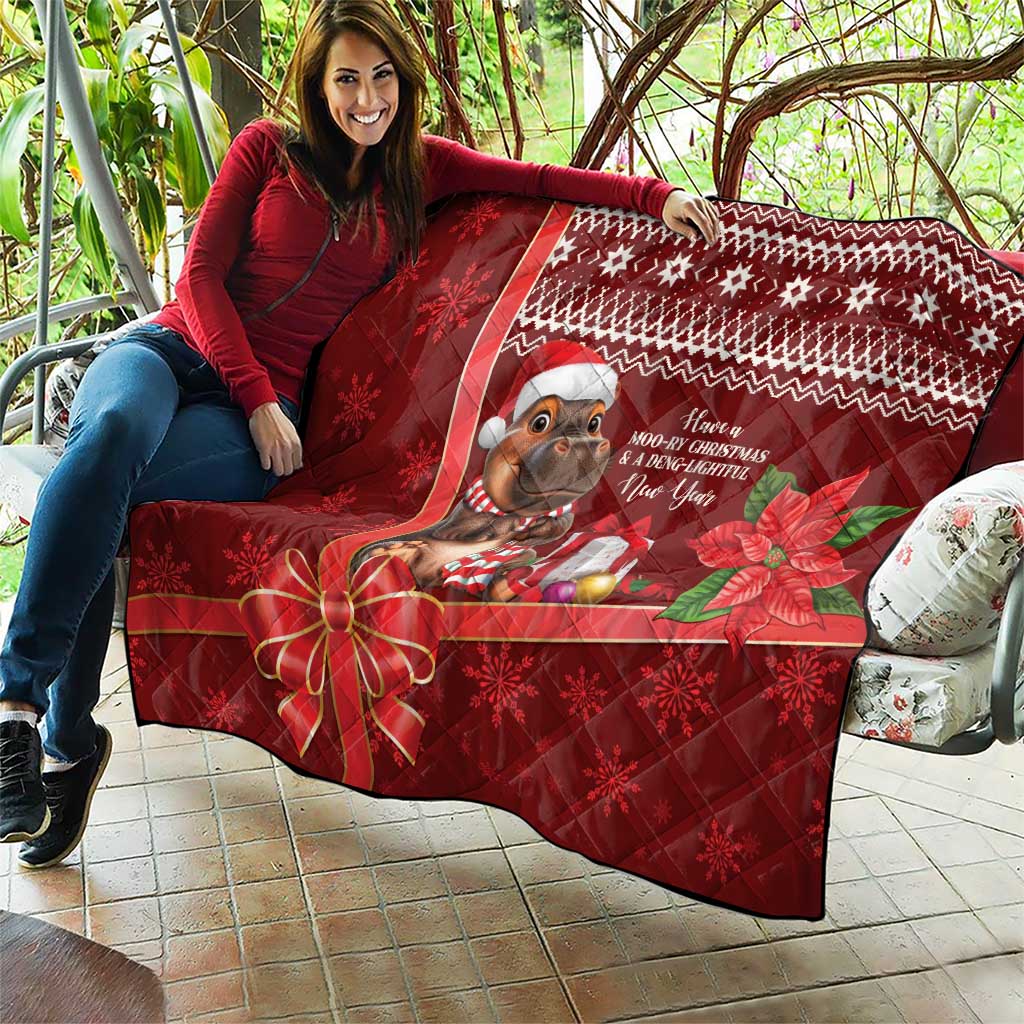 Red Christmas quilt held on patio sofa, cartoon mouse, wrapped presents, poinsettias and stars