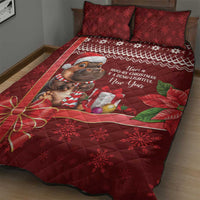 Red Christmas quilt bed set with buffalo character, plaid stripe panel, and green leaf accents