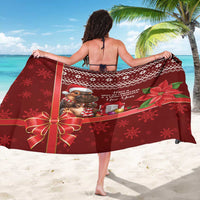 Red Christmas sarong worn with wide holiday border and cartoon character, snowflakes, poinsettia