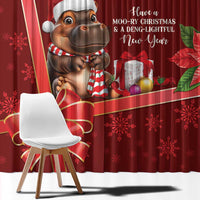 Red Christmas curtain with close-up cartoon cow, candles, poinsettia, and holiday message