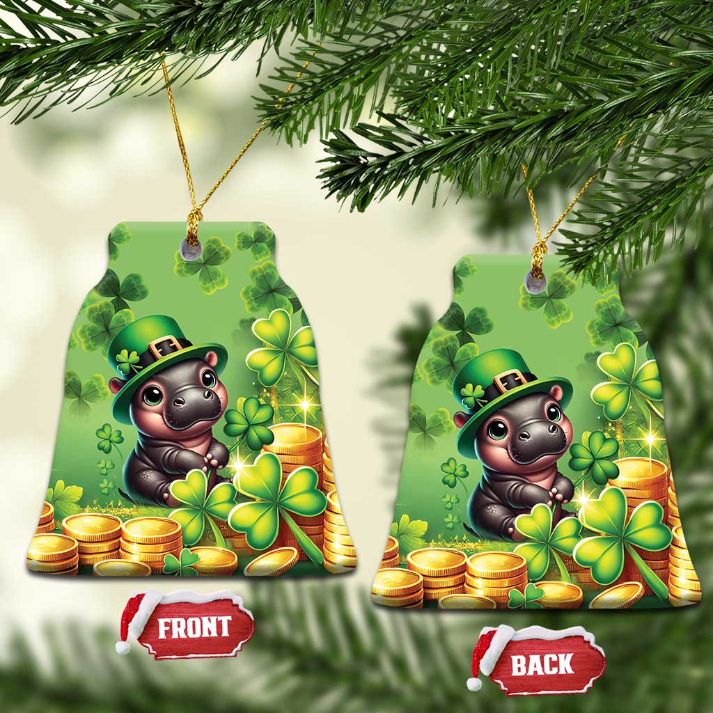 Green bell-shaped St. Patrick's Day ceramic ornament set with cartoon bear, clovers, coins.