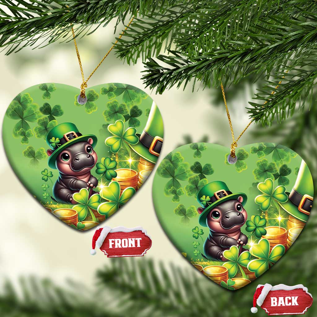 Green heart-shaped St. Patrick's Day ceramic ornament with cartoon bear, clovers, and coins.