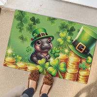 Green St Patrick's Day rubber doormat with cartoon leprechaun hippo, clovers, and gold coins