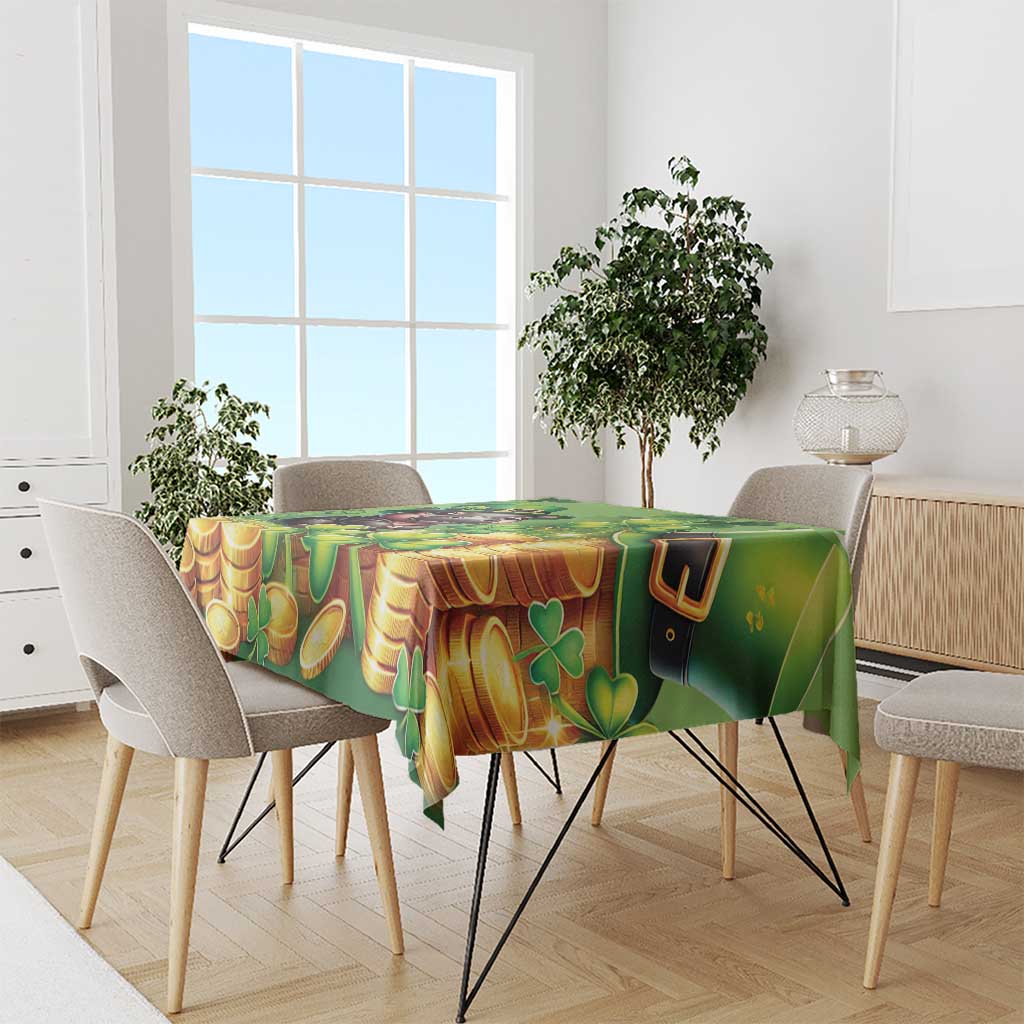 Green tablecloth with gold coins and shamrocks, leprechaun hat design on table