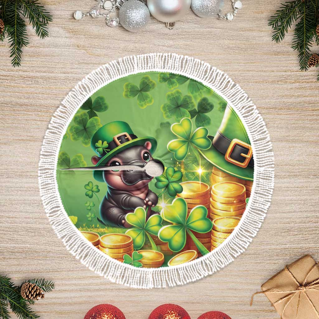 Green round tree skirt with fringed border featuring mouse holding leprechaun hat