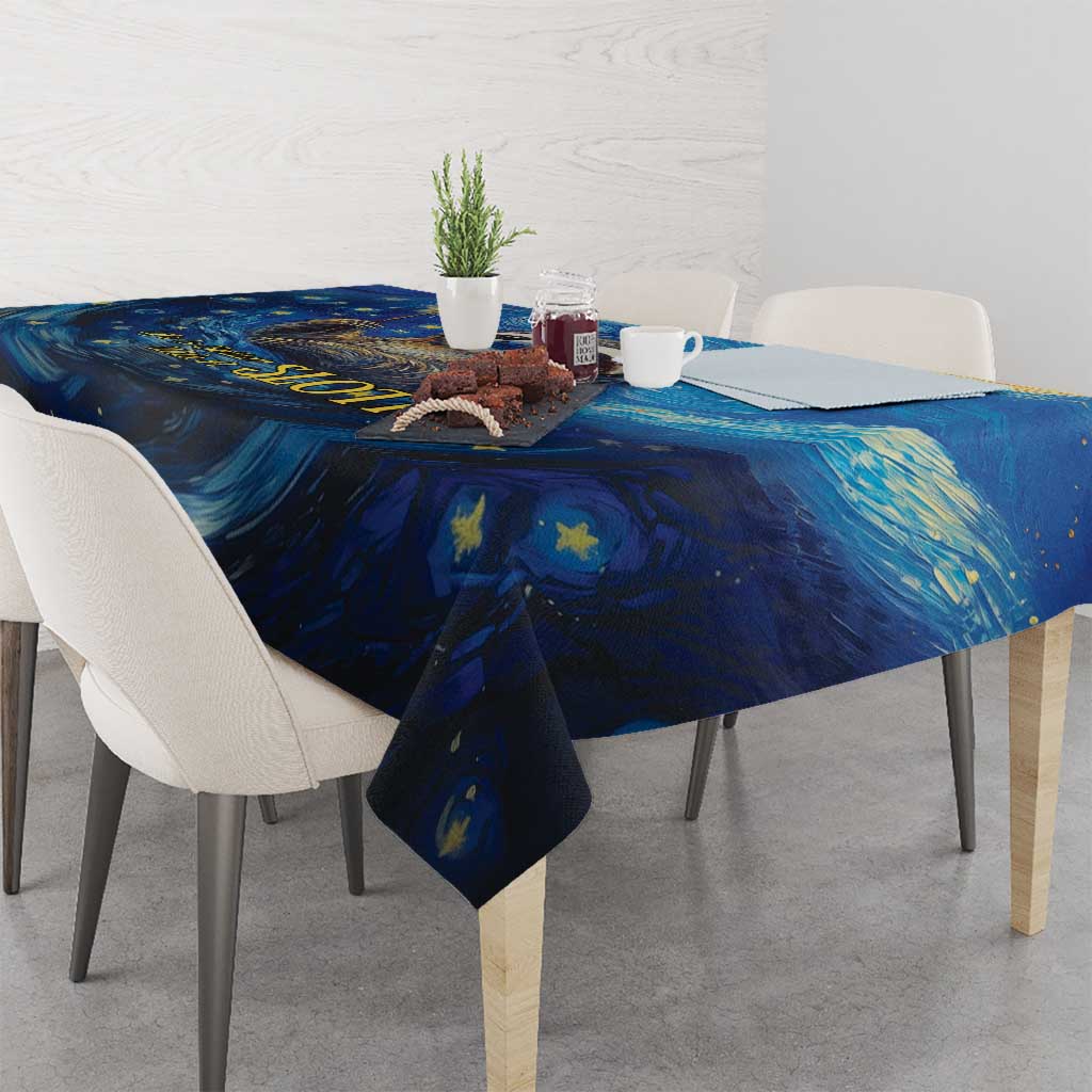 Blue starry galaxy tablecloth draped over dining table with matching corner drops