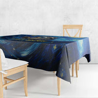 Blue galaxy starry night tablecloth with draped edge over wooden dining table