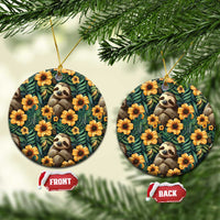 Round ceramic ornament with sleeping sloth and orange flowers on dark green leaves pattern