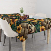 Green tablecloth with sloths and yellow flowers, corner drape over dining seats.