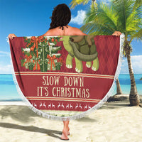 Round red Christmas beach blanket with sloth riding turtle, “Slow down it’s Christmas” text