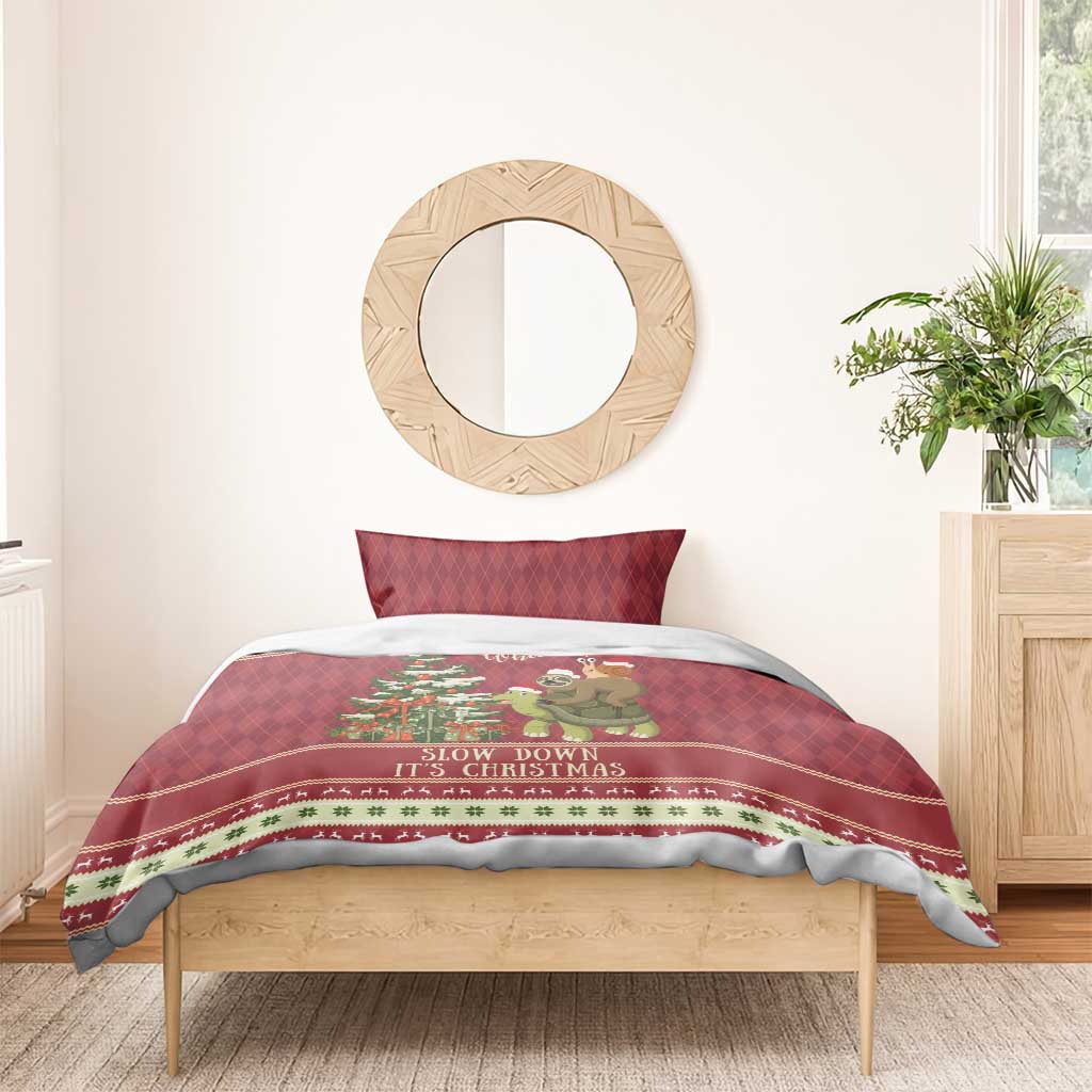 Red Christmas bedding set with sloth on turtle and festive border, duvet and pillow