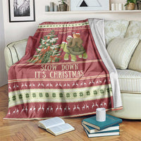 Red Christmas throw blanket with sloth turtle ride and 'Slow Down It's Christmas' text