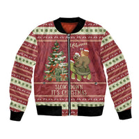 Red unisex bomber jacket with sloth and snail Christmas graphic, ribbed cuffs and hem