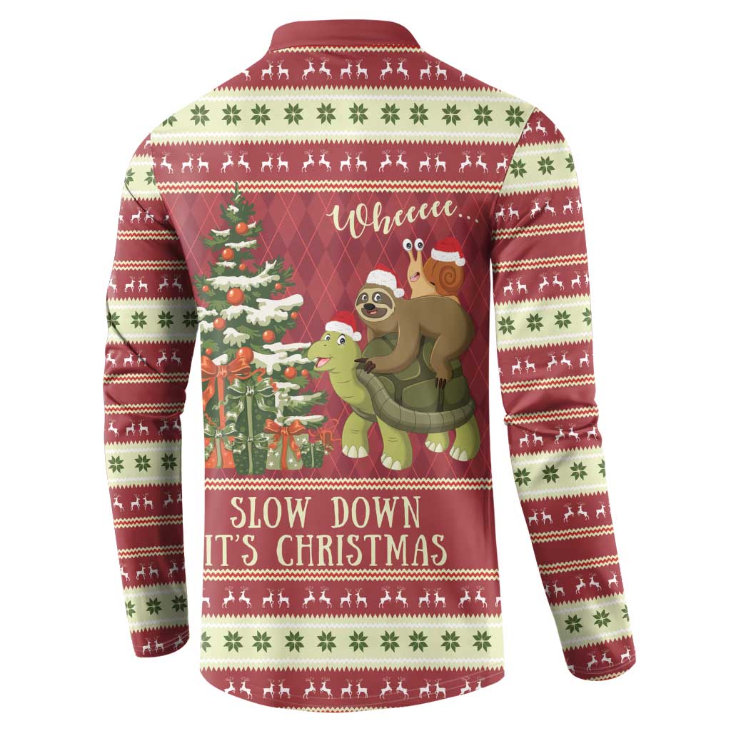 Back of maroon Christmas henley sweatshirt with sloth and turtle graphic and “Slow Down” text