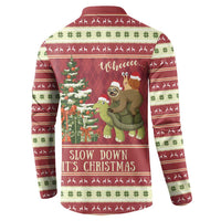Back of maroon Christmas henley sweatshirt with sloth and turtle graphic and “Slow Down” text