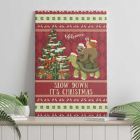 Red Christmas canvas wall art with sloth and snail riding a turtle, tree and "Slow down" text