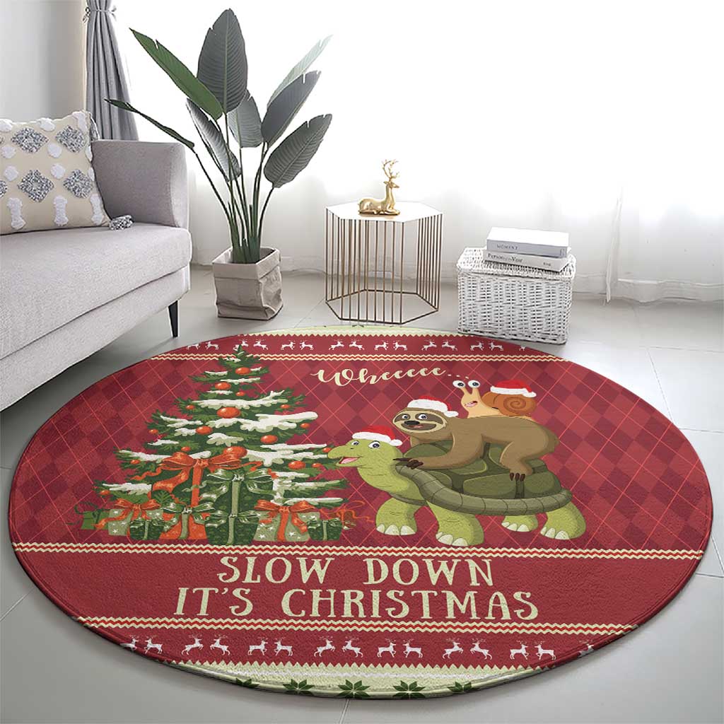 Red round Christmas rug with sloth on turtle, 'Slow down It's Christmas'