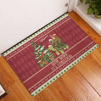 Red Christmas rubber doormat: sloth & snail riding a turtle, 'Slow Down It's Christmas'