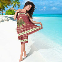 Red Christmas sarong worn around the waist, turtle-riding sloth and border