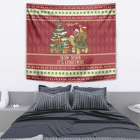 Red Christmas tapestry featuring a sloth and snail riding a turtle near a decorated tree