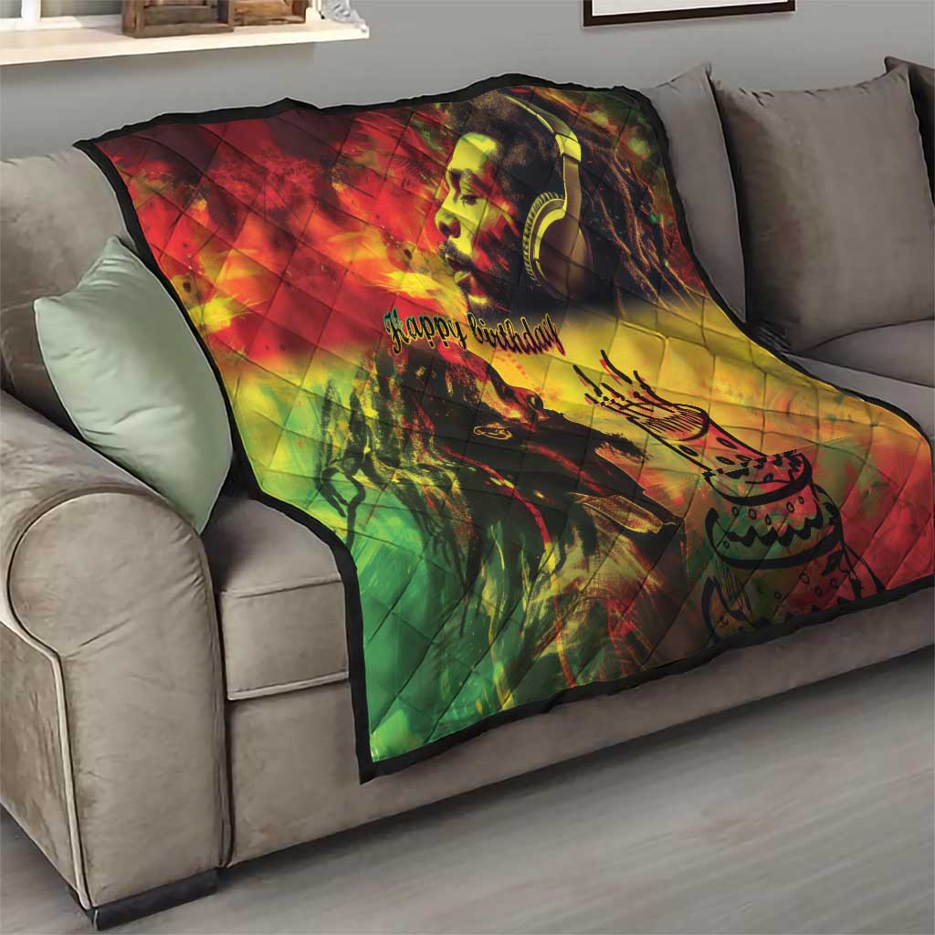 Reggae quilt on a sofa featuring king portrait, “Happy Birthday” text, and diamond quilting