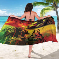 Colorful reggae birthday sarong with 'Happy birthday' text and crown face graphic