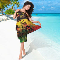 Reggae birthday sarong featuring 'Happy birthday' and crown face art in yellow green red
