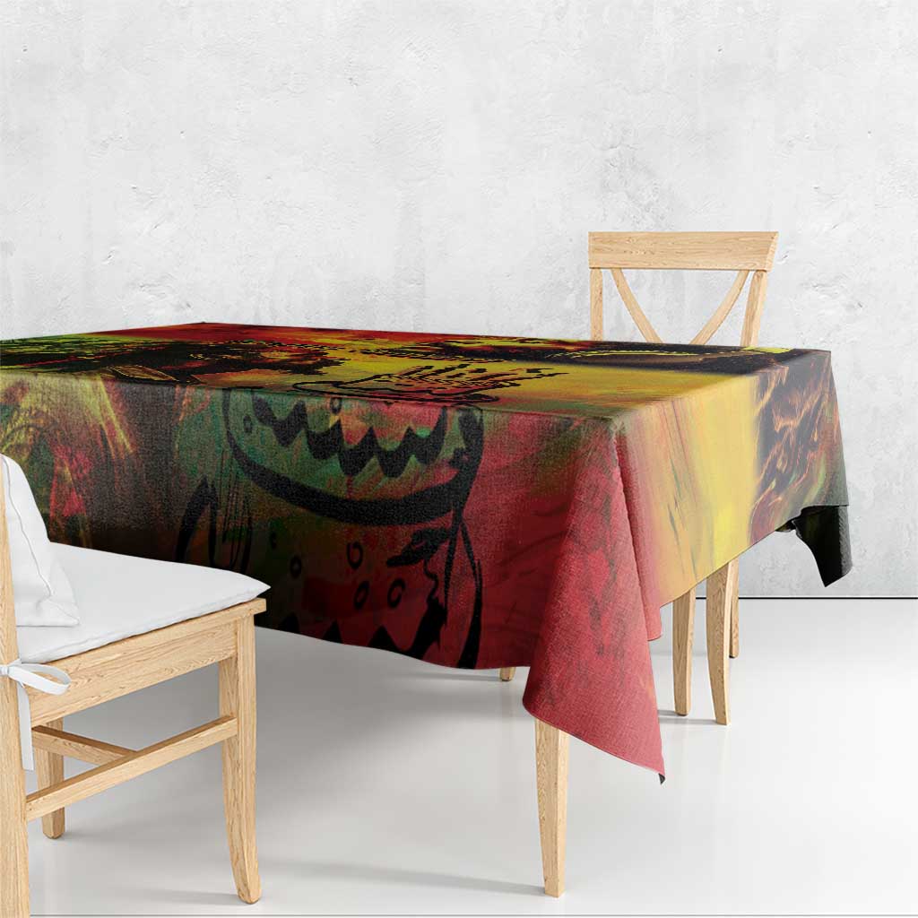 Reggae birthday tablecloth, black green and red artwork with yellow highlight, side view