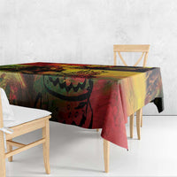 Reggae birthday tablecloth, black green and red artwork with yellow highlight, side view