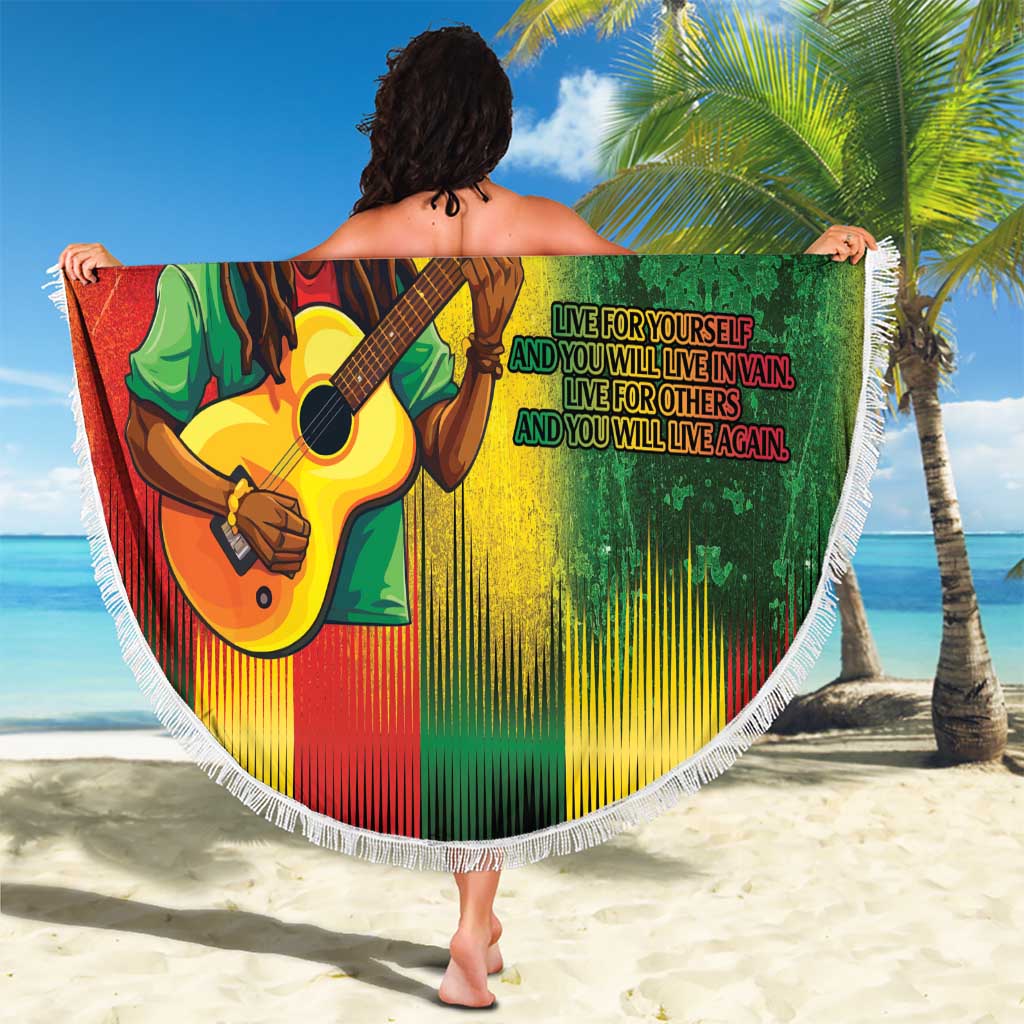 Reggae beach blanket with guitarist holding acoustic guitar, white fringe and quote text