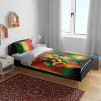 Reggae bedding set on bed with colorful striped duvet featuring guitarist graphic and 2 pillows