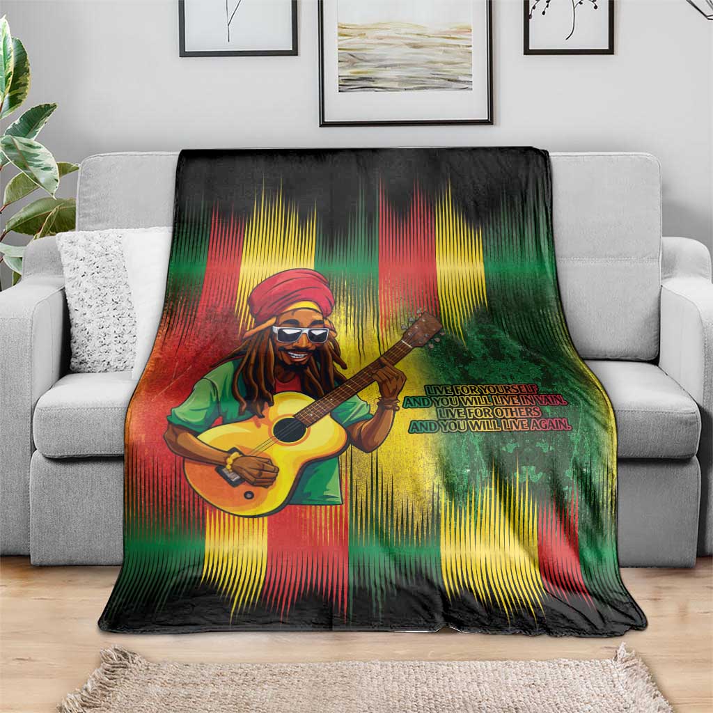 Bob birthday blanket featuring guitarist holding a guitar, green red yellow streaks on sofa