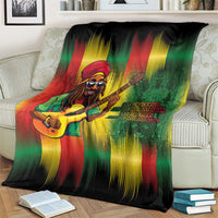 Bob birthday blanket close-up with guitarist graphic, green red yellow streaks and text