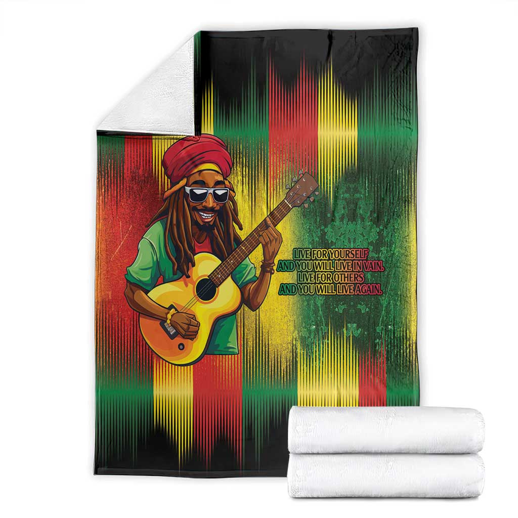Bob birthday blanket folded display with guitarist graphic and green red yellow streak pattern