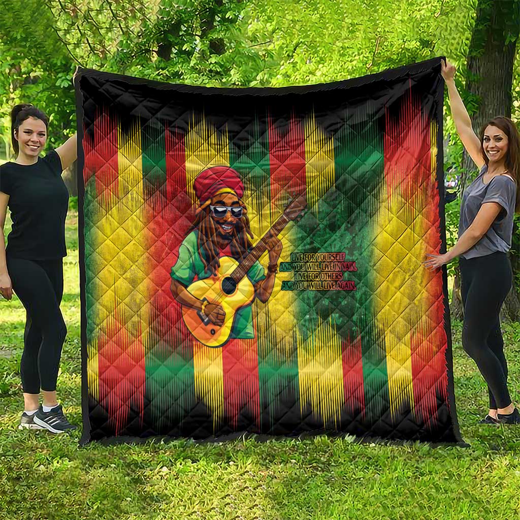 Multicolor reggae-themed quilt with Bob portrait playing guitar on black background