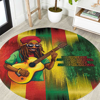Round reggae-themed carpet with illustrated musician playing an acoustic guitar in green red yellow.