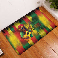 Rubber doormat featuring a guitarist illustration and red yellow green striped pattern