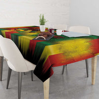 Reggae striped tablecloth with multicolor bands draped over a dining table