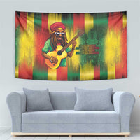Reggae guitarist wall tapestry with bright vertical stripes and guitar player illustration