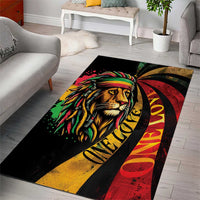 Rastafarian lion area rug, One Love text across multicolor reggae stripes on black