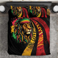 Lion face bedding set with colorful rastafarian-style graphics on black background