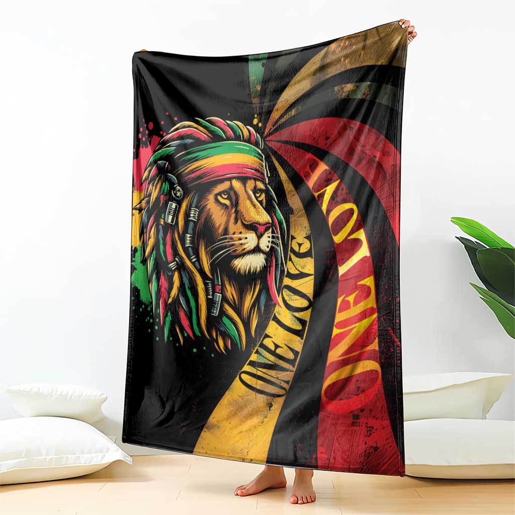 Black blanket featuring a lion head graphic in reggae colors with red, yellow, and green rays